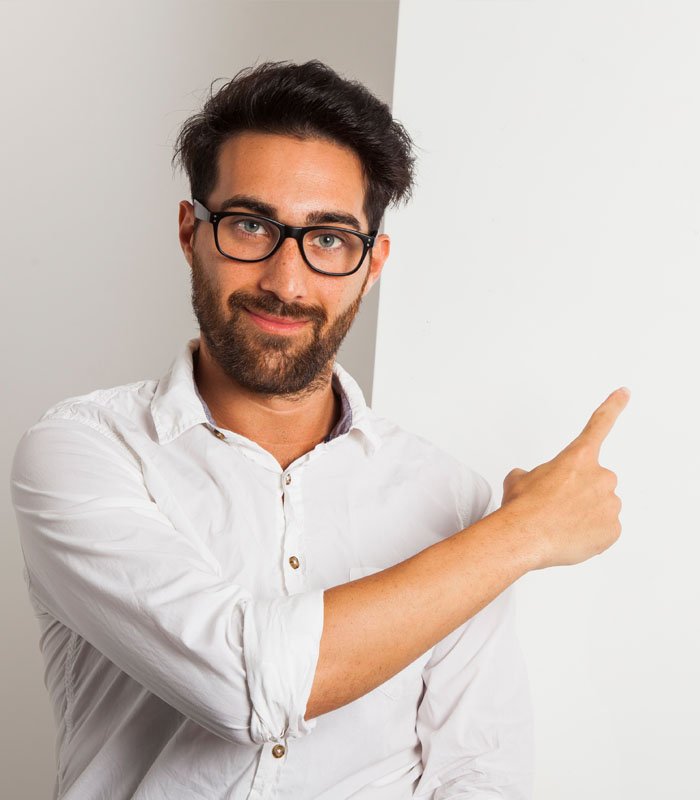 Cheerful businessman in eyeglasses in office